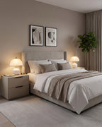 Pair of white Petal Dome lamps on nightstands on both sides of a bed