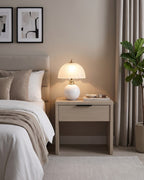 White Petal Dome ceramic lamp on a light gray nightstand