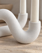 White: Close-up of the material and finish of the Knot Sculptural Double Candle Holder