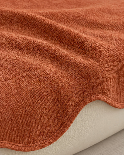 Rust Haze: Close-up of the fabric of the All-Season Plain Contour Fit Sofa Cover