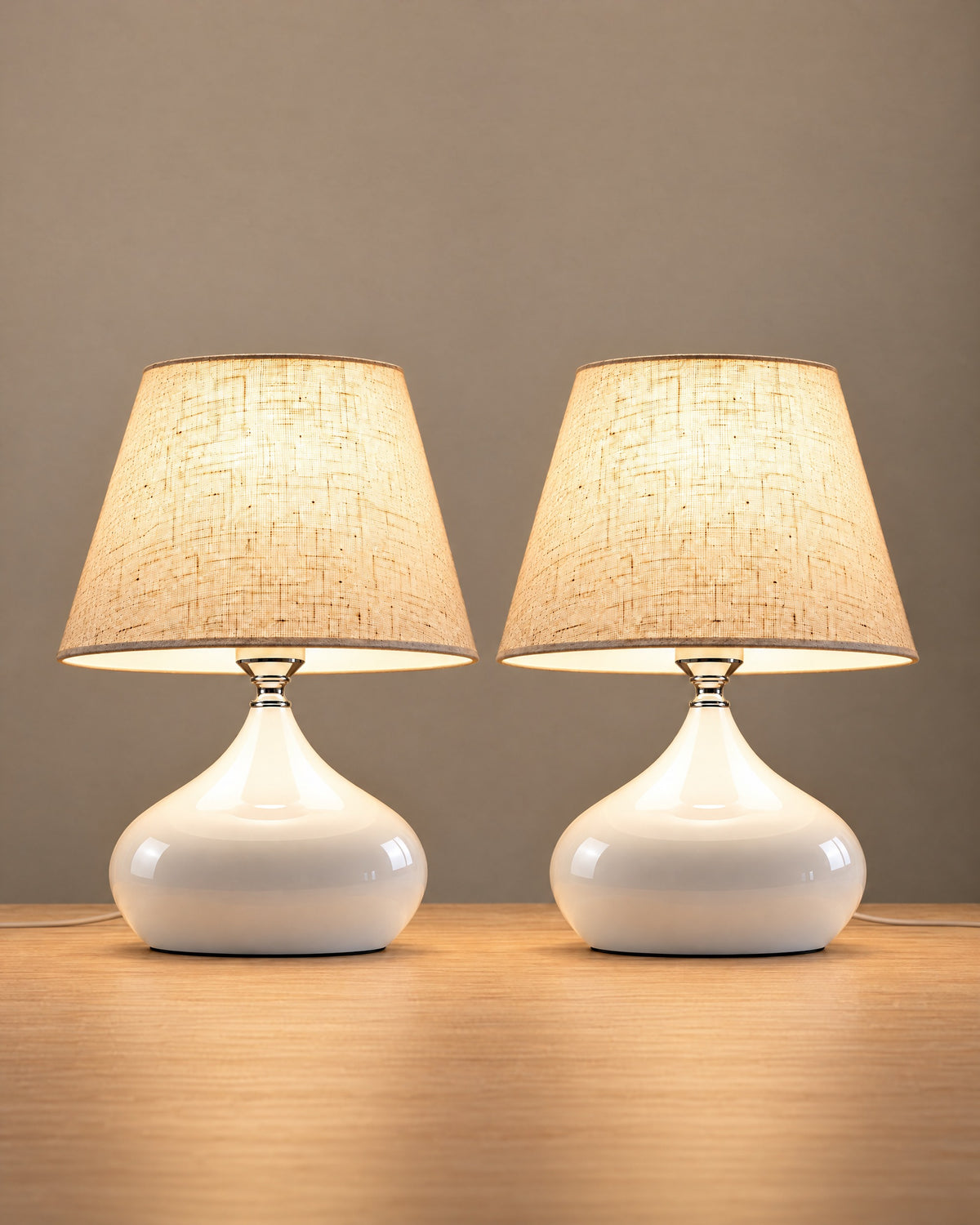 Aria White Ceramic Nightstand Lamp, Set of 2, both lamps switched on