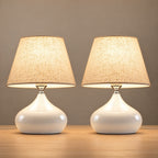Aria White Ceramic Nightstand Lamp, Set of 2, both lamps switched on