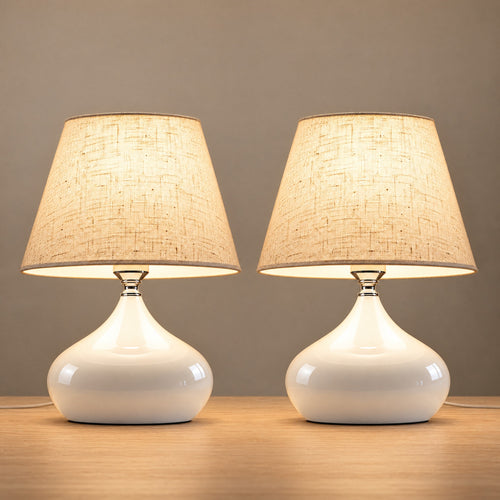 Aria White Ceramic Nightstand Lamp, Set of 2, both lamps switched on