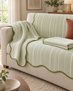 Sage Stripe: Aurivelle Herringbone Scallop Edge Sofa Cover draped over the sofa arm