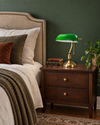 Bankers Green Glass Nightstand Lamp switched off in soft morning daylight