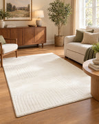 Beige High-Low Area Rug, Carved Arcs, Washable shown in proportion to the furniture around it