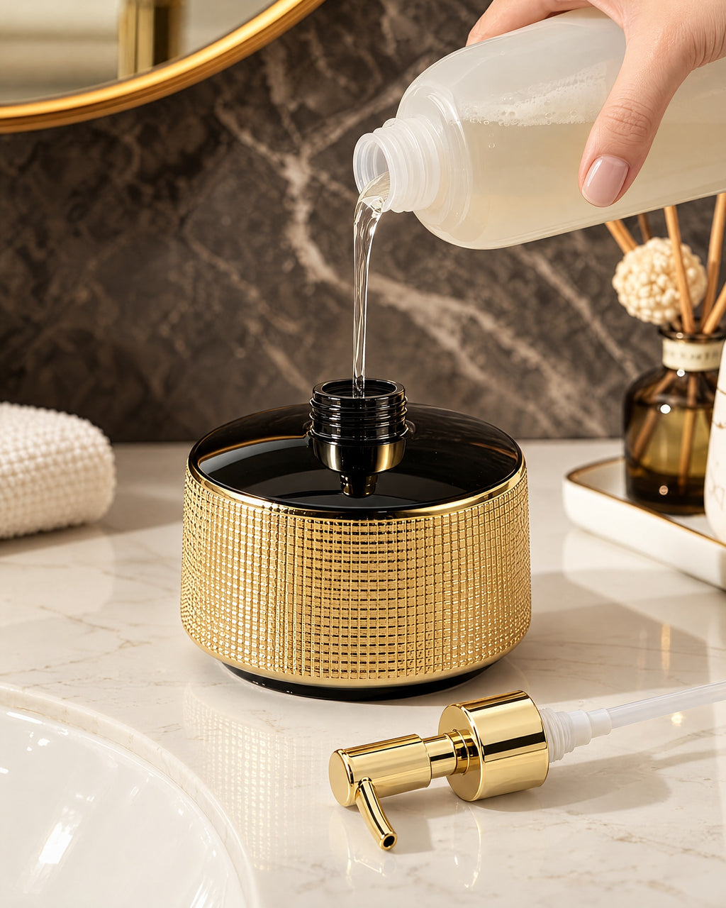 The Woven Texture Soap Dispenser, Ceramic, Black and Gold, 12.5 oz being refilled, pump set aside