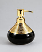 Soap Dispenser, Ceramic, Black with Brushed Gold, 9 oz against a seamless studio backdrop