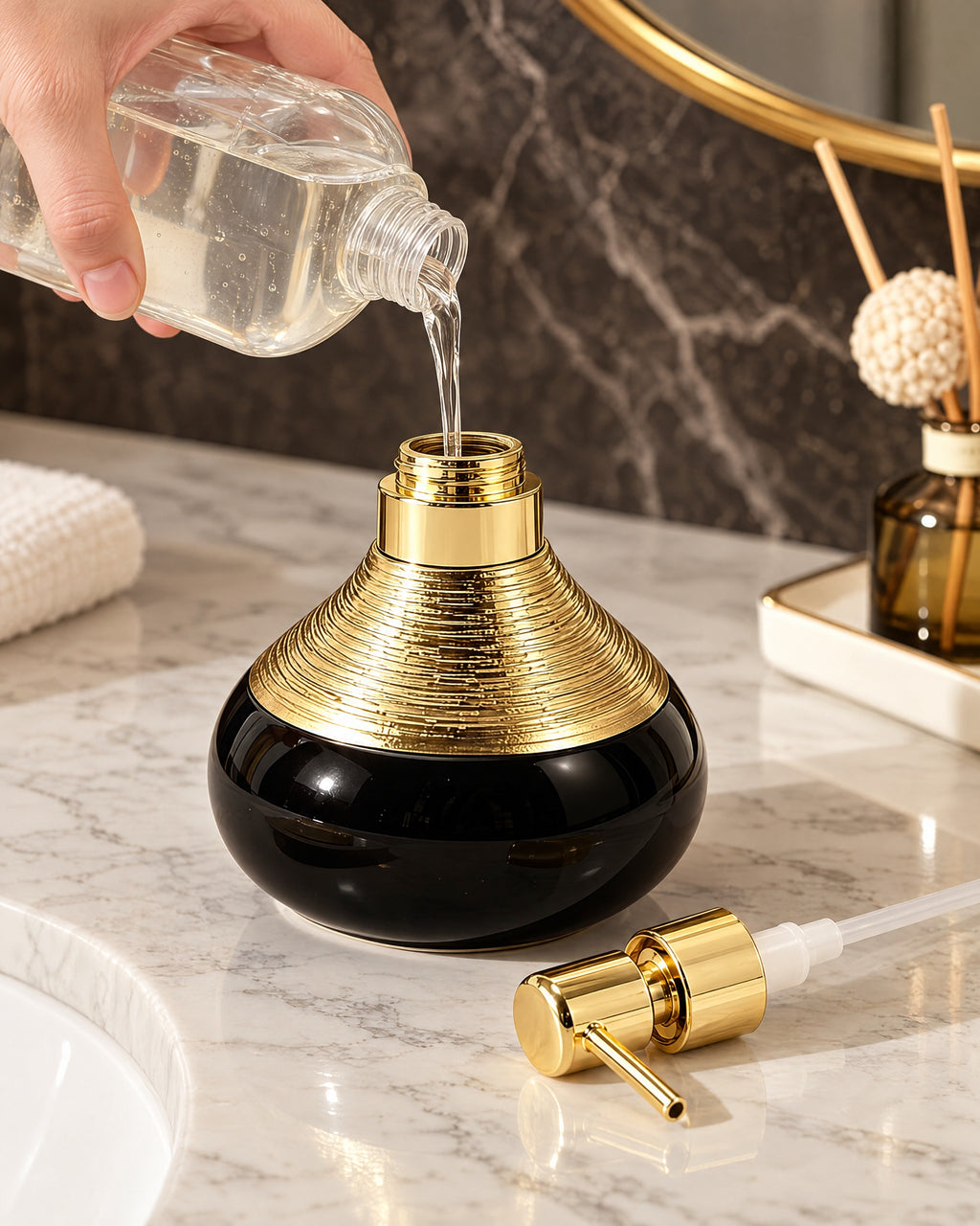 The Soap Dispenser, Ceramic, Black with Brushed Gold, 9 oz being refilled, pump set aside