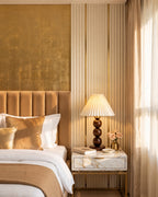 Walnut: Bobbin Trio Wood Nightstand Lamp on a marble nightstand in a golden glam bedroom