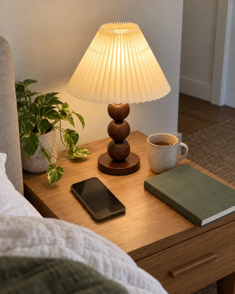 Bobbin Trio Wood Nightstand Lamp in a real home