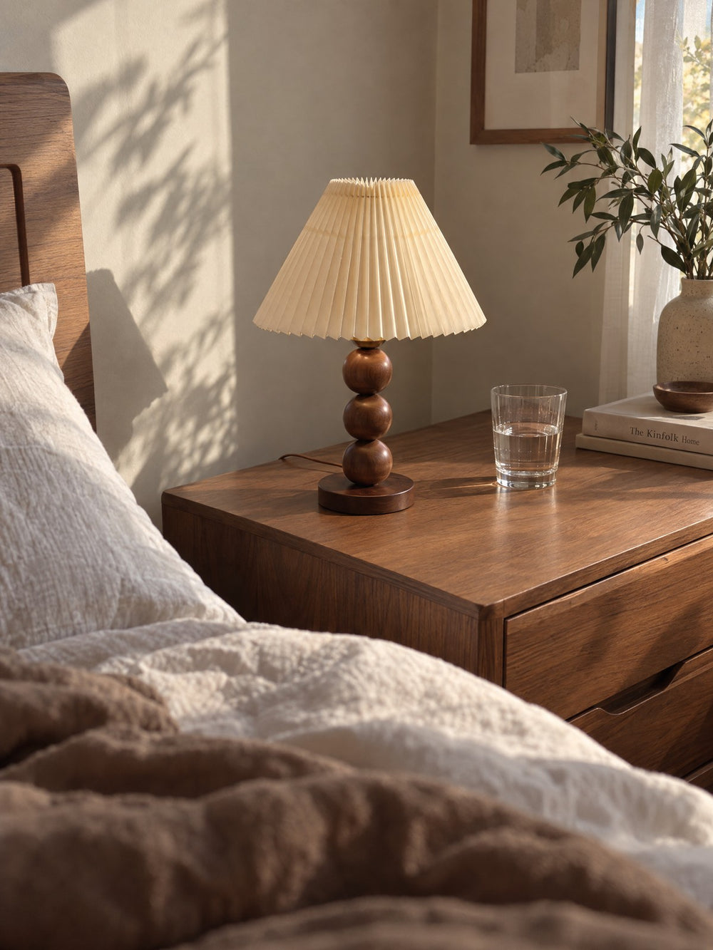 Bobbin Trio Wood Nightstand Lamp seen from bed in the morning
