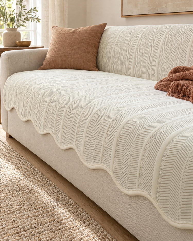Sofa cover in cream on a sofa