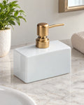 White: Ceramic Soap Dispenser, Rectangular, Gold Pump, 13.5 oz on a bathroom vanity in soft daylight