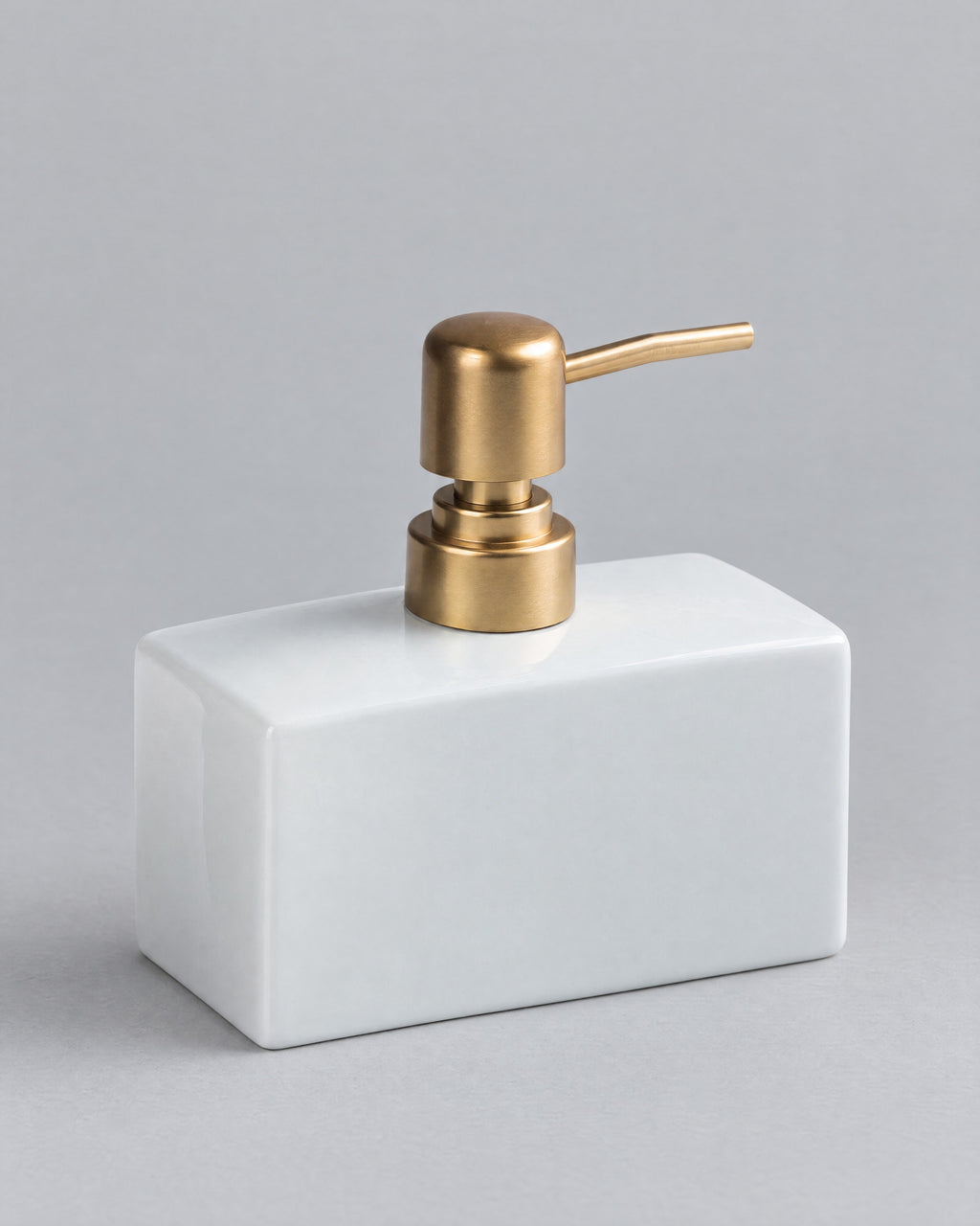 White: Ceramic Soap Dispenser, Rectangular, Gold Pump, 13.5 oz against a seamless studio backdrop