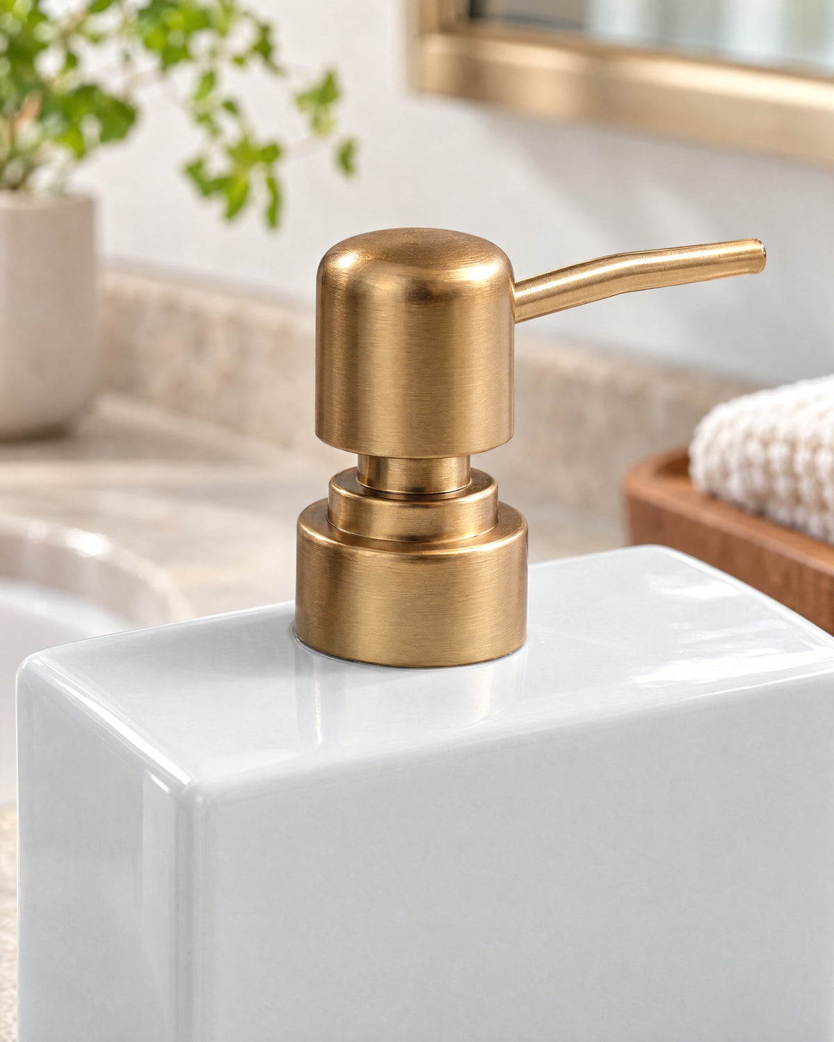 White: Close-up of the glaze and pump finish of the Ceramic Soap Dispenser, Rectangular, Gold Pump, 13.5 oz