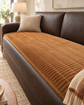 Golden Amber: Cozy Quilted Couch Cover Protector, styled on a sofa