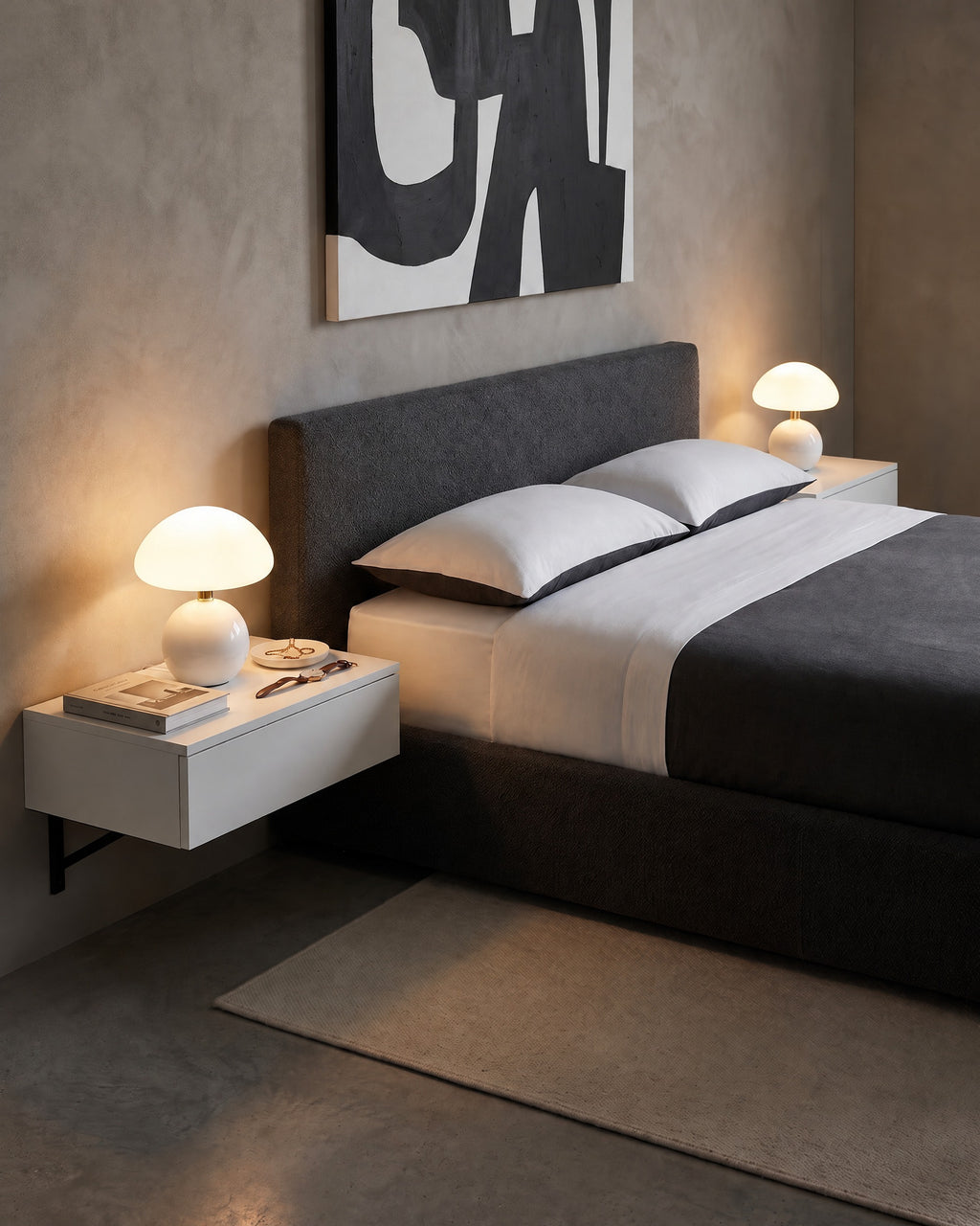Pair of white Dolce mushroom lamps on floating nightstands on each side of a gray bed