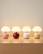 All colourways of the Dolce Mushroom Nightstand Lamp side by side: Pink, Wine Red, White, Cream