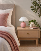 Pink: Dolce Mushroom Nightstand Lamp in pink switched off in soft morning daylight