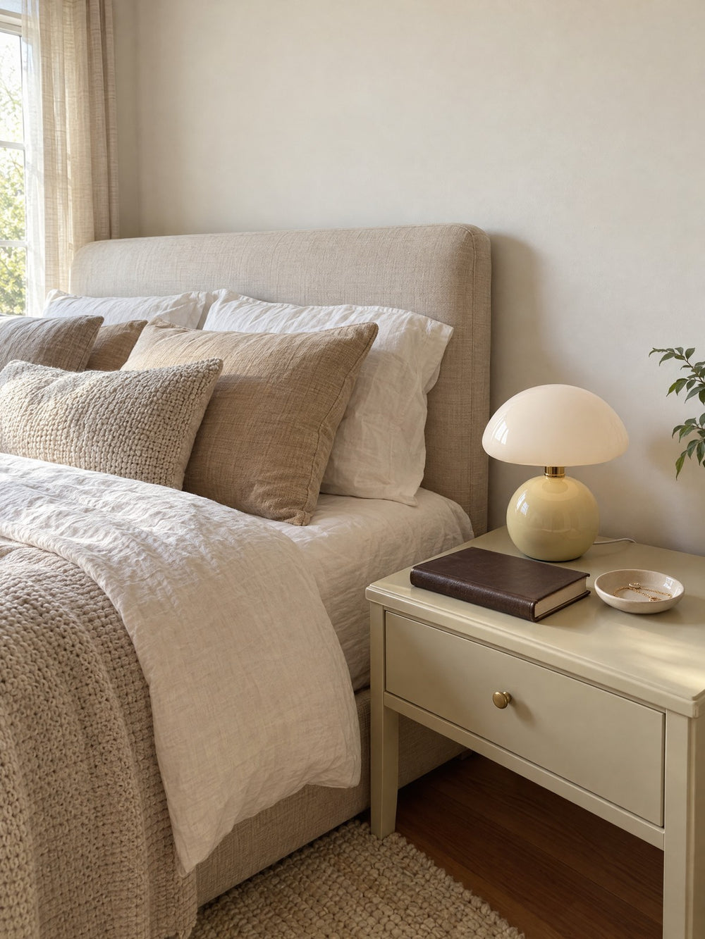Dolce Mushroom Nightstand Lamp on a nightstand in daylight