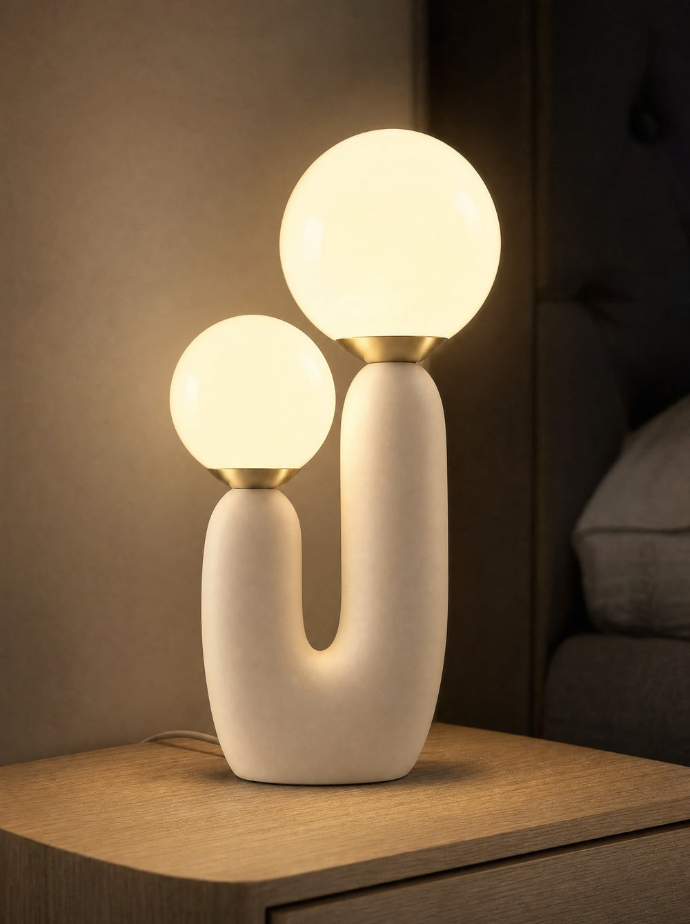 Duo Globe Sculptural Nightstand Lamp, close-up, lit