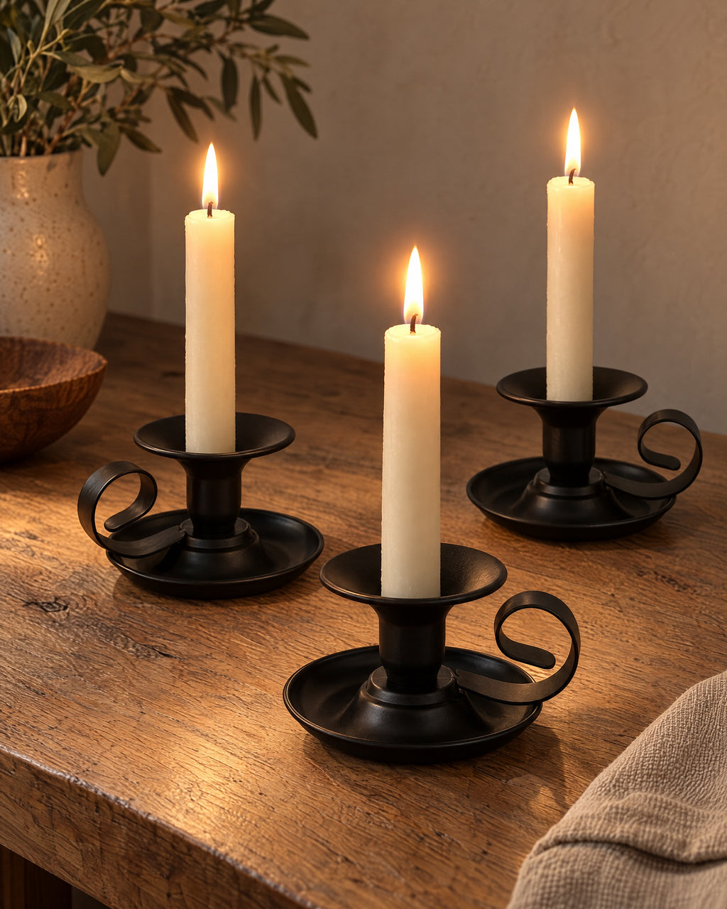 Tazza Iron Teacup Candle Holder, three styled together with lit candles