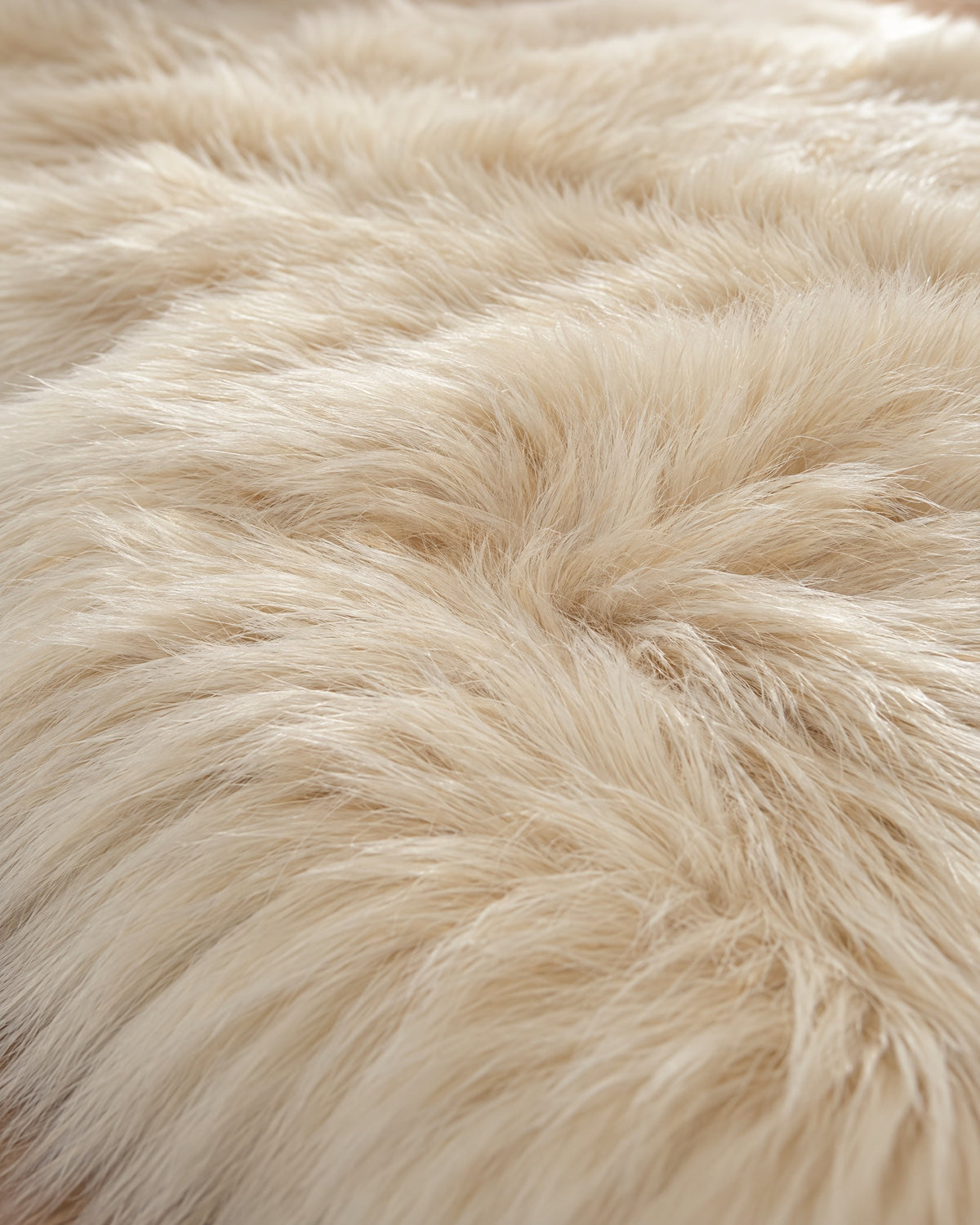 Cream: Close-up of the pile of the Faux Sheepskin Rug, Cream, 2.8 in Fluffy Pile