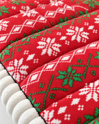 Festive Red: Close-up of the fabric of the Festive Holiday Winter Sofa Cover