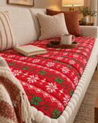 Festive Red: Festive Holiday Winter Sofa Cover on a cozy lived-in sofa