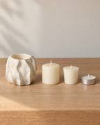 Low & Wide: Wave Abstract Ceramic Candle Holder with the candle type that fits, shown beside it