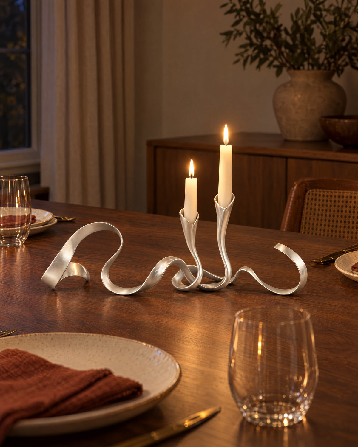 Silver: Ribbon Metal Candelabra, lit, in a lived-in evening scene