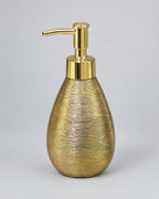 Teardrop Soap Dispenser, Ceramic, Brushed Gold against a seamless studio backdrop