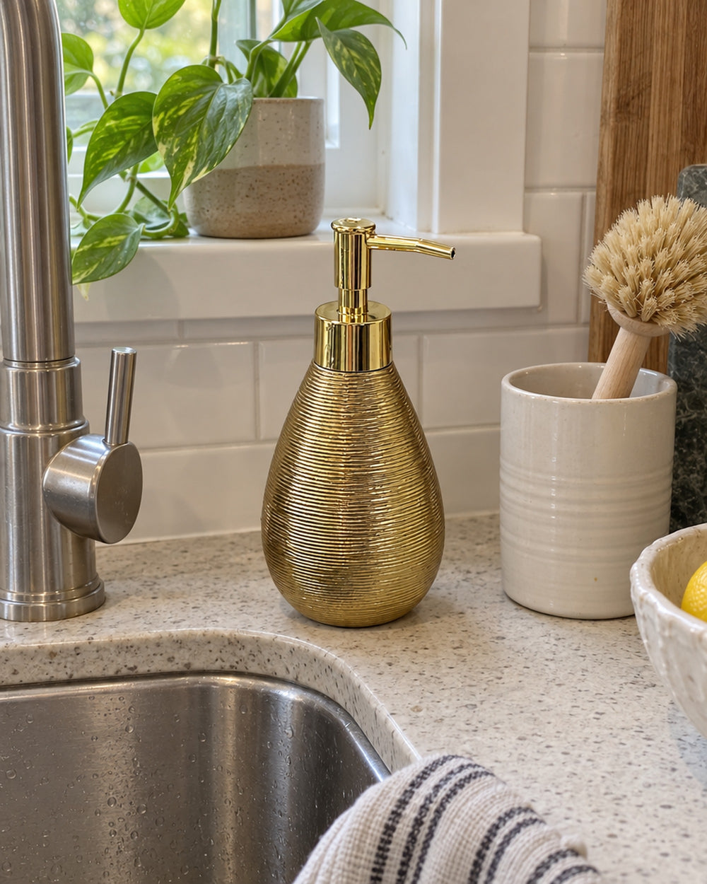 Teardrop Soap Dispenser, Ceramic, Brushed Gold in a real home