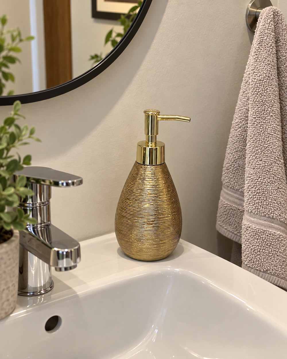 Teardrop Soap Dispenser, Ceramic, Brushed Gold in a real home