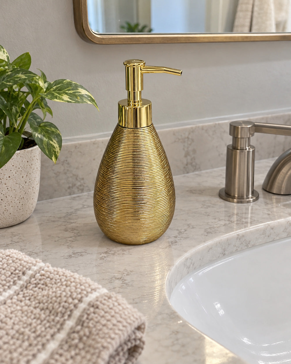 Teardrop Soap Dispenser, Ceramic, Brushed Gold in a real home