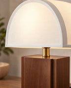 White Trim: Close-up of the walnut / white trim finish and hardware of the Halvo Half Dome Walnut Nightstand Lamp