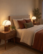 White Trim: Two Halvo Half Dome Walnut Nightstand Lamp lamps in walnut / white trim flanking a bed at night