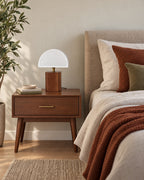 White Trim: Halvo Half Dome Walnut Nightstand Lamp in walnut / white trim switched off in soft morning daylight