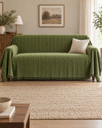 Green: Herringbone Chenille Tassels Sofa Cover shown on a full sofa