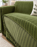 Green: The reverse side of the Herringbone Chenille Tassels Sofa Cover