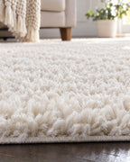Ivory: Close-up of the pile of the Ivory Shag Area Rug, 1.1 in Plush Pile