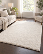 Ivory: Ivory Shag Area Rug, 1.1 in Plush Pile shown in proportion to the furniture around it