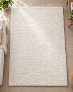 Ivory: The Ivory Shag Area Rug, 1.1 in Plush Pile seen flat from above