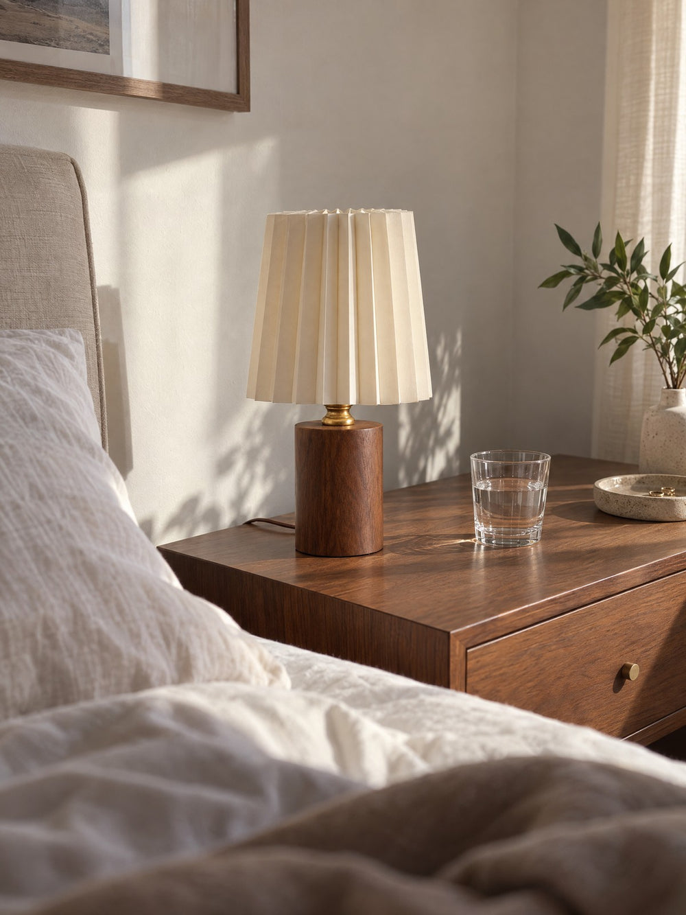 Linnea Pleated Wood Nightstand Lamp seen from bed in the morning