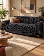 Charcoal Black: Luxury Urban Maze Sofa Cover in a warm living room