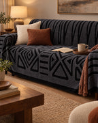 Charcoal Black: Luxury Urban Maze Sofa Cover on a cozy lived-in sofa