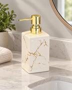 White: Marble Soap Dispenser, Square Ceramic, Gold Pump on a bathroom vanity in soft daylight