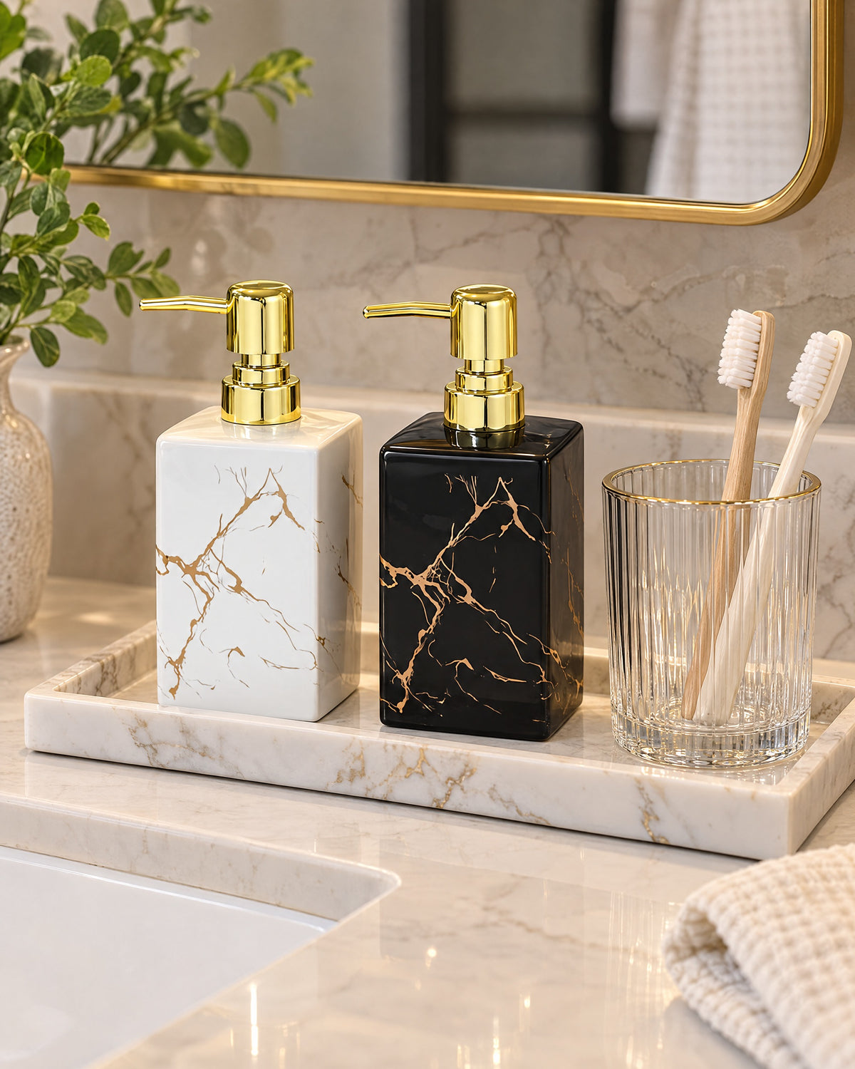 White: Both color variants of the Marble Soap Dispenser, Square Ceramic, Gold Pump on a tray