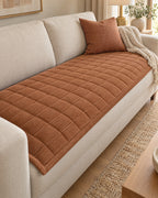 Chestnut Haze: Metro Line Quilted Couch Cover Mat, styled on a sofa
